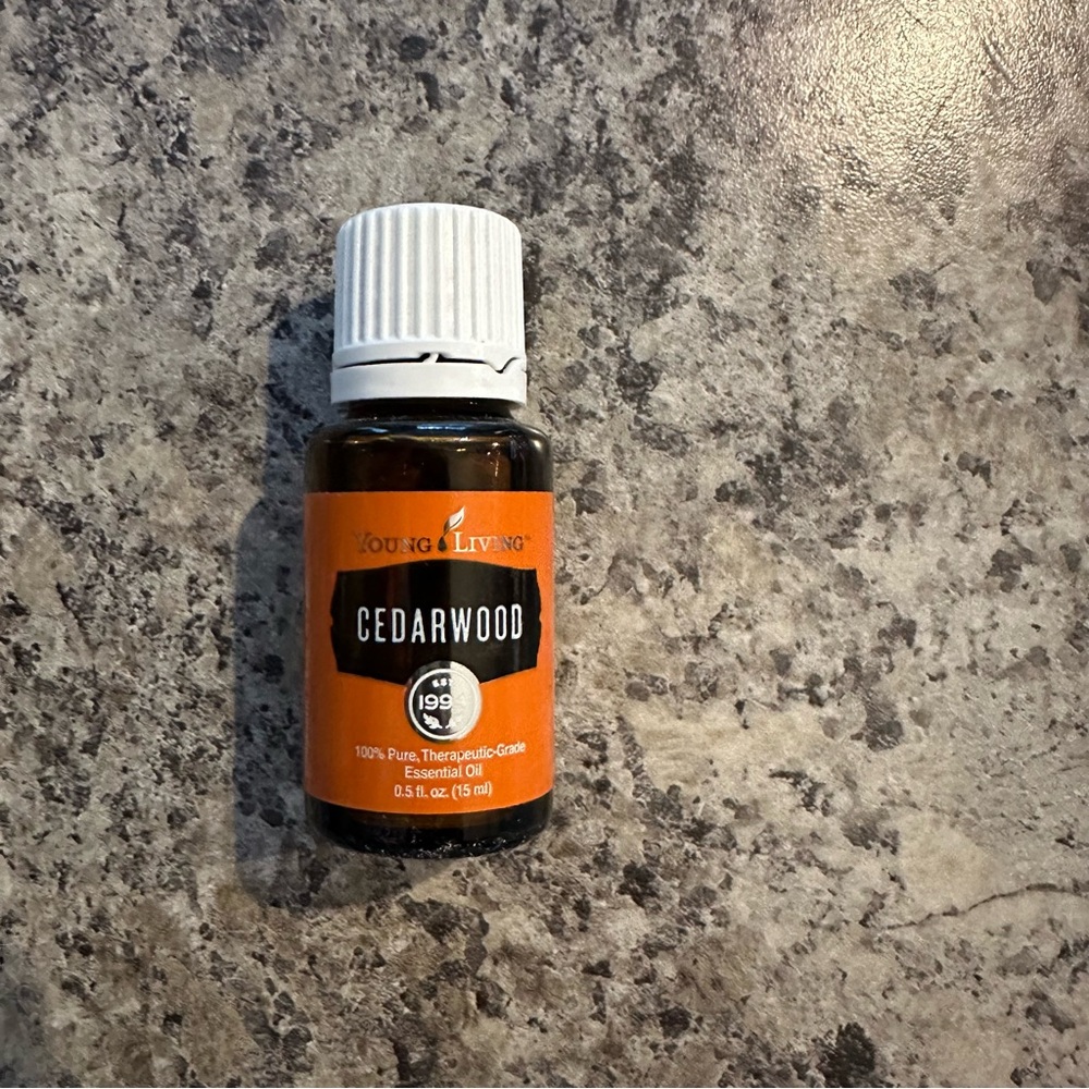 Young Living Cedarwood Oil in Orange and White